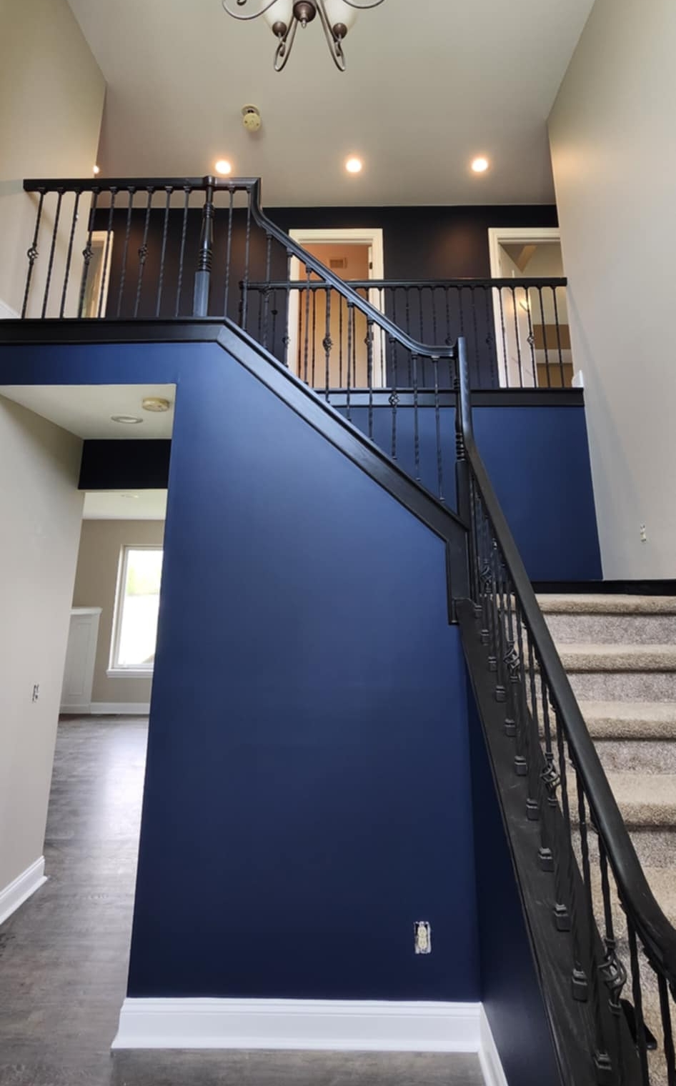 Stairway Architecture Transformed by Navy Paint Coatings