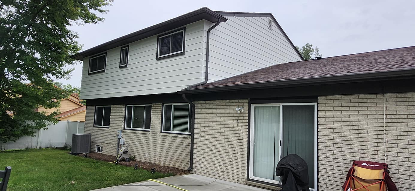 Finished complete black and white house repaint transformation